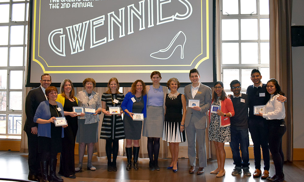 Feature image group portrait of award winners in front of a sign that reads 2ND ANNUAL GWENNIES