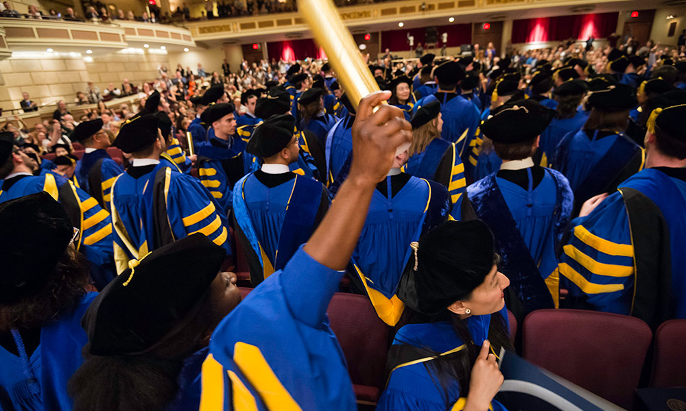 graduates cheering