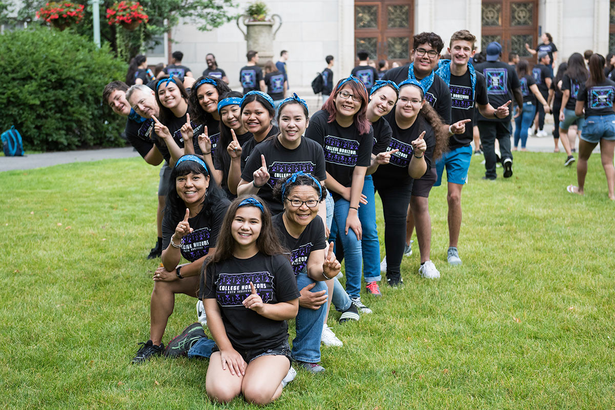 high school students in College Horizons shirts assemble on Eastman Quad