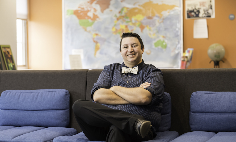photo of Colleen Raimond, the University's LGBTQ coordinator, sitting in her office