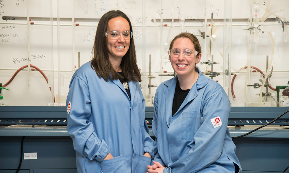 Chemistry professor Ellen Matson and PhD student Brittney Petel in Matson's laboratory