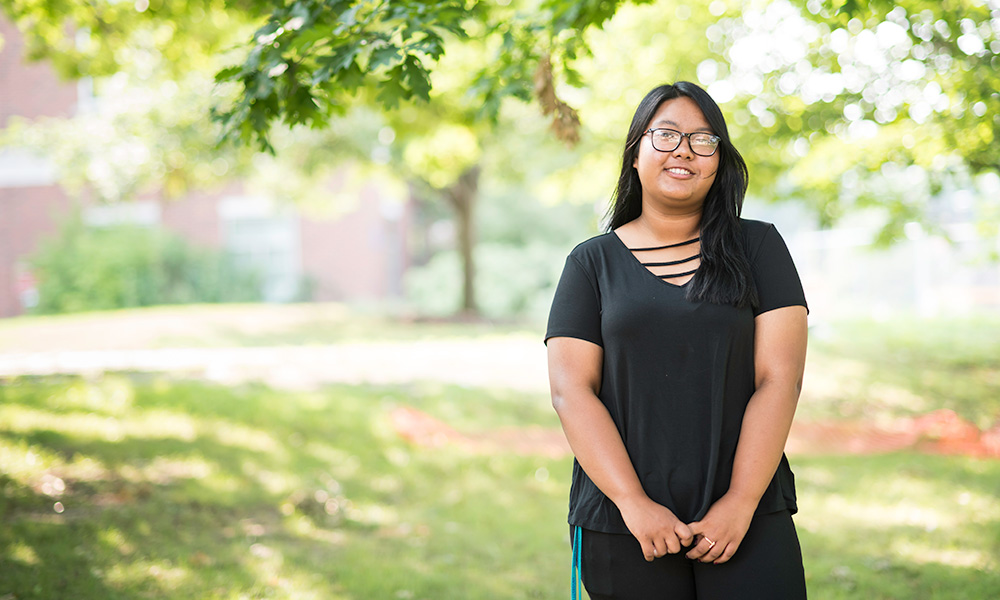 Feature image Prajita Shrestha, posing on the quad