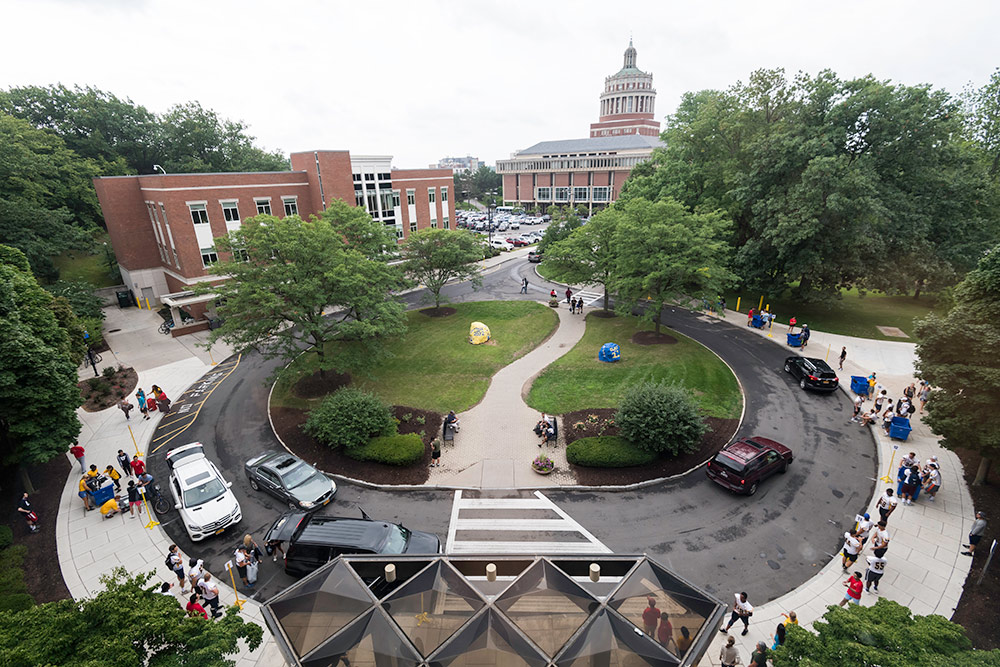 aerial photo of the line of cars snaking around Susan B. Anthony Hall