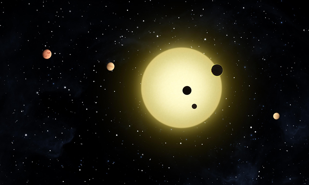 Feature image artist illutration of a compact soloar system with five planets around a central bright star