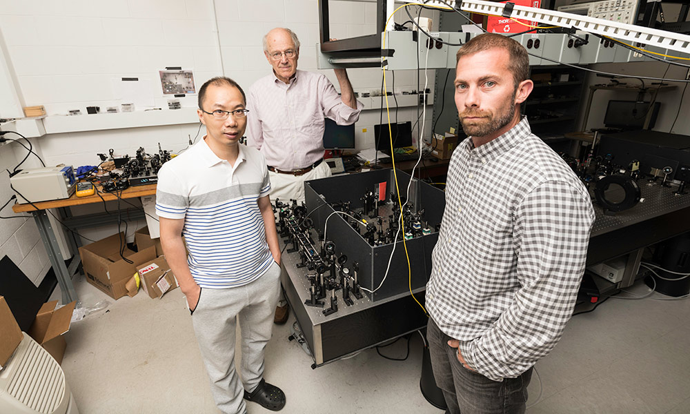 portrait of people in lab exploring wave particle duality