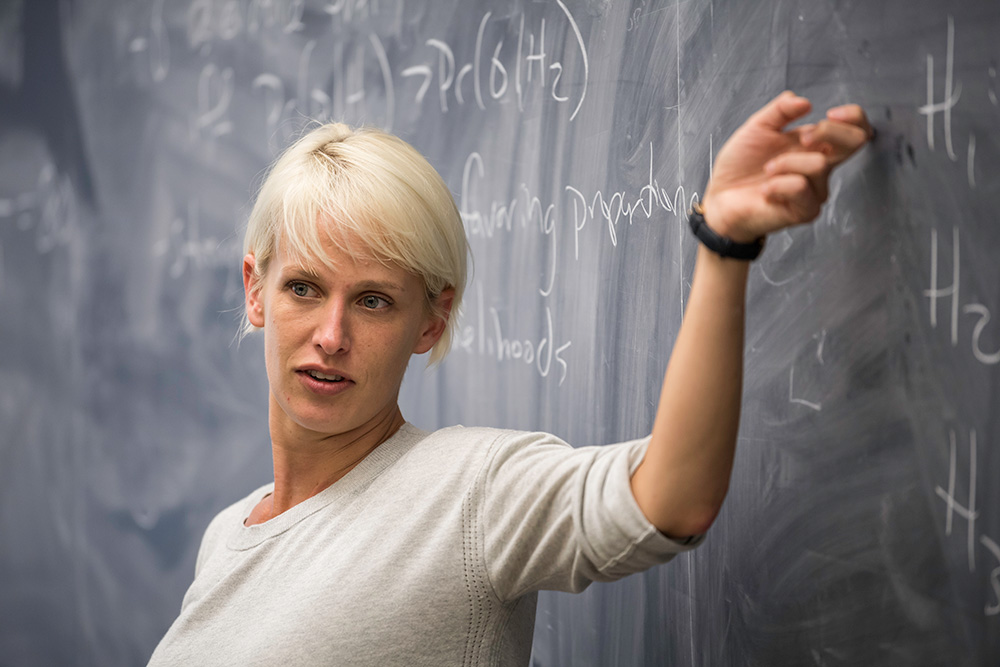 Hayley Clatterbuck at a blackboard