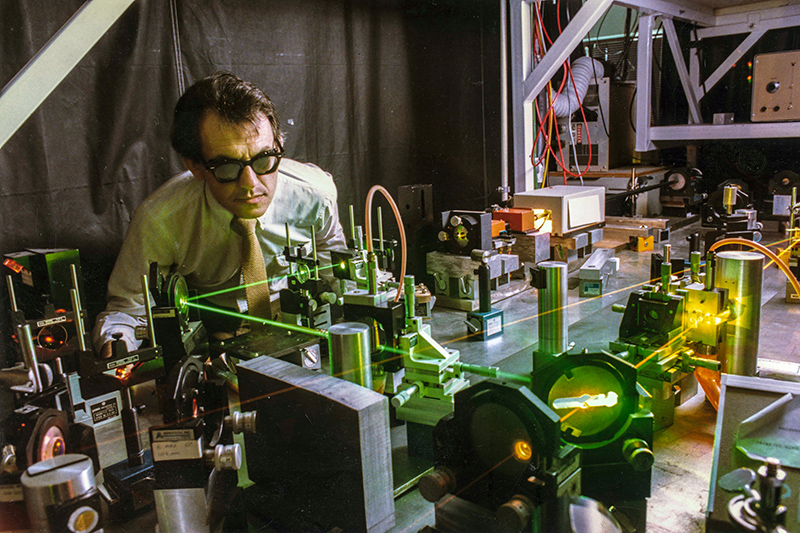 Gerard Mourou in the lab with laser beams