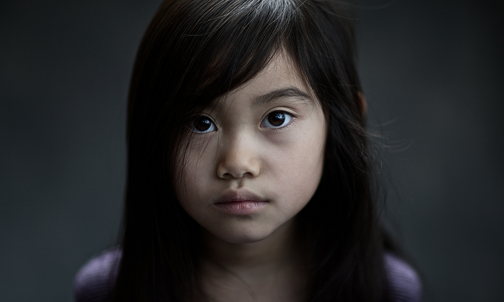 Feature image portrait of a child with a worried expression