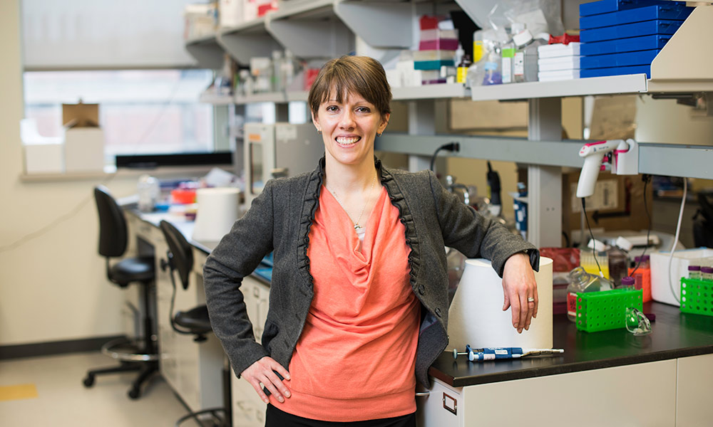 Feature image Danielle Benoit poses for a photo in her lab.