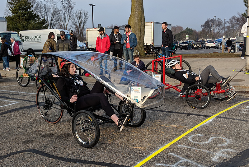 human-powered vehicles line up at the start of a race