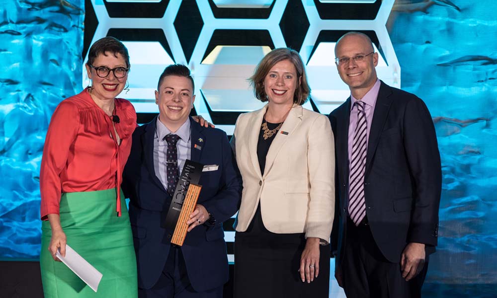 Group shot of the EVERFI award being presented in Nashville.
