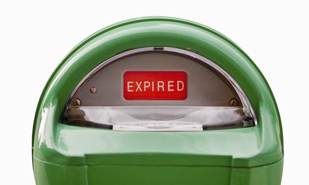 Close up of an expired parking meter.