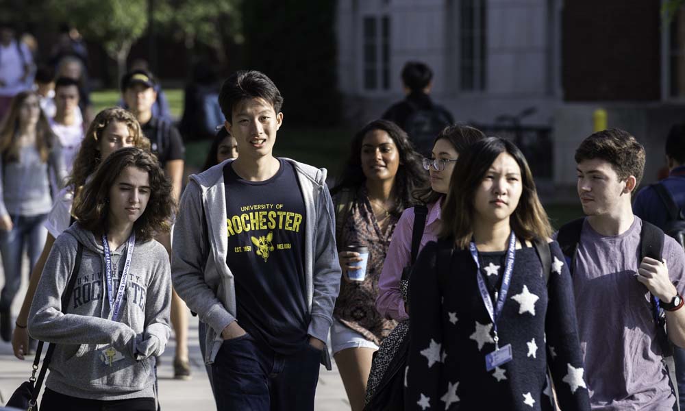 Feature image University of Rochester students walk on the River Campus during the first day of classes.