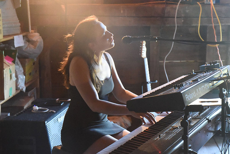 musician playing the piano.