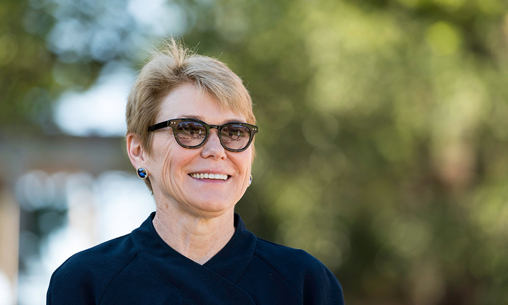 photograph of Sarah Mangelsdorf touring campus