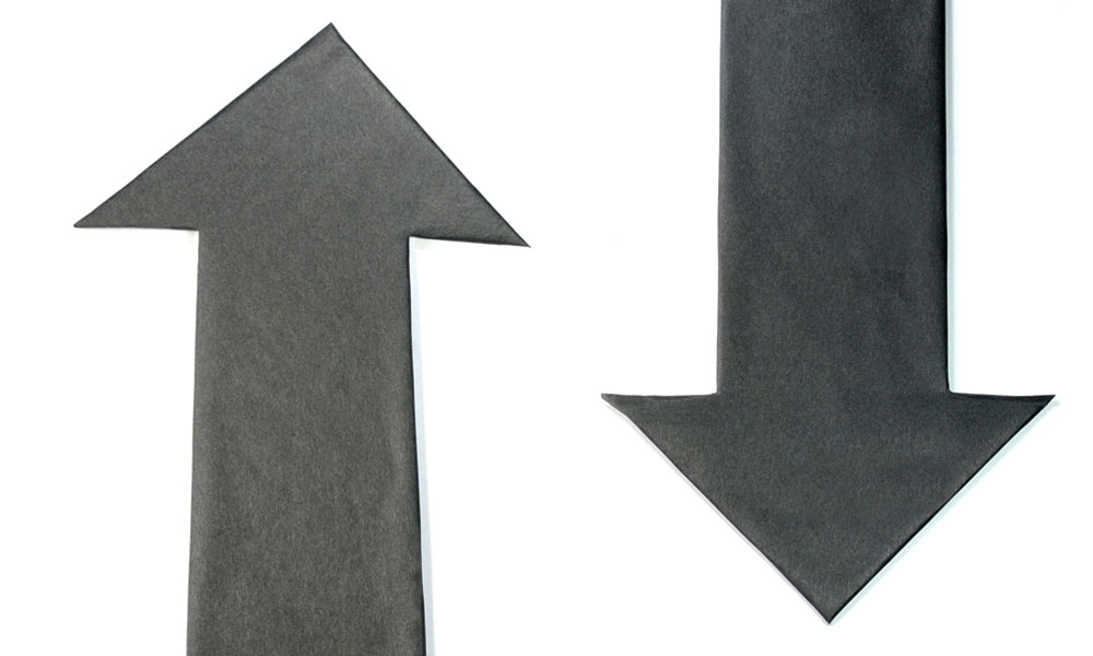 Feature image Two dark gray arrow signs, one pointing up, the other down.