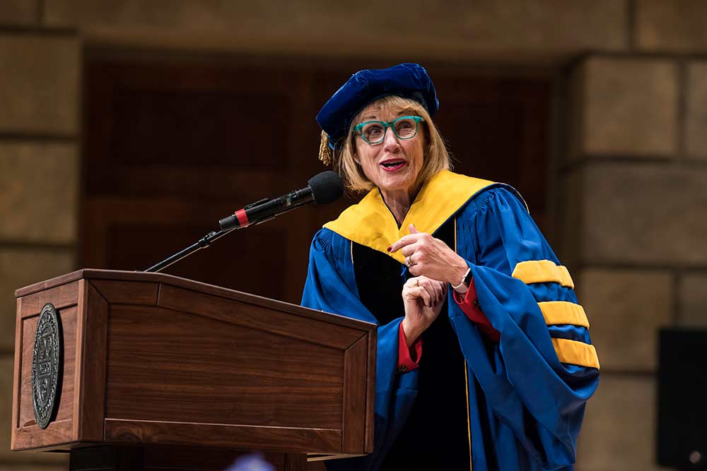 Cathy Minehan speaks at podium