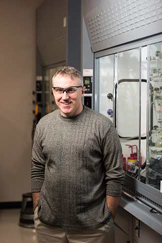 portrait of Todd Kraus in his lab.