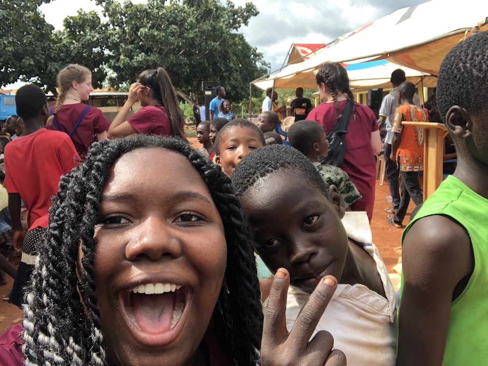 student selfie with young boy