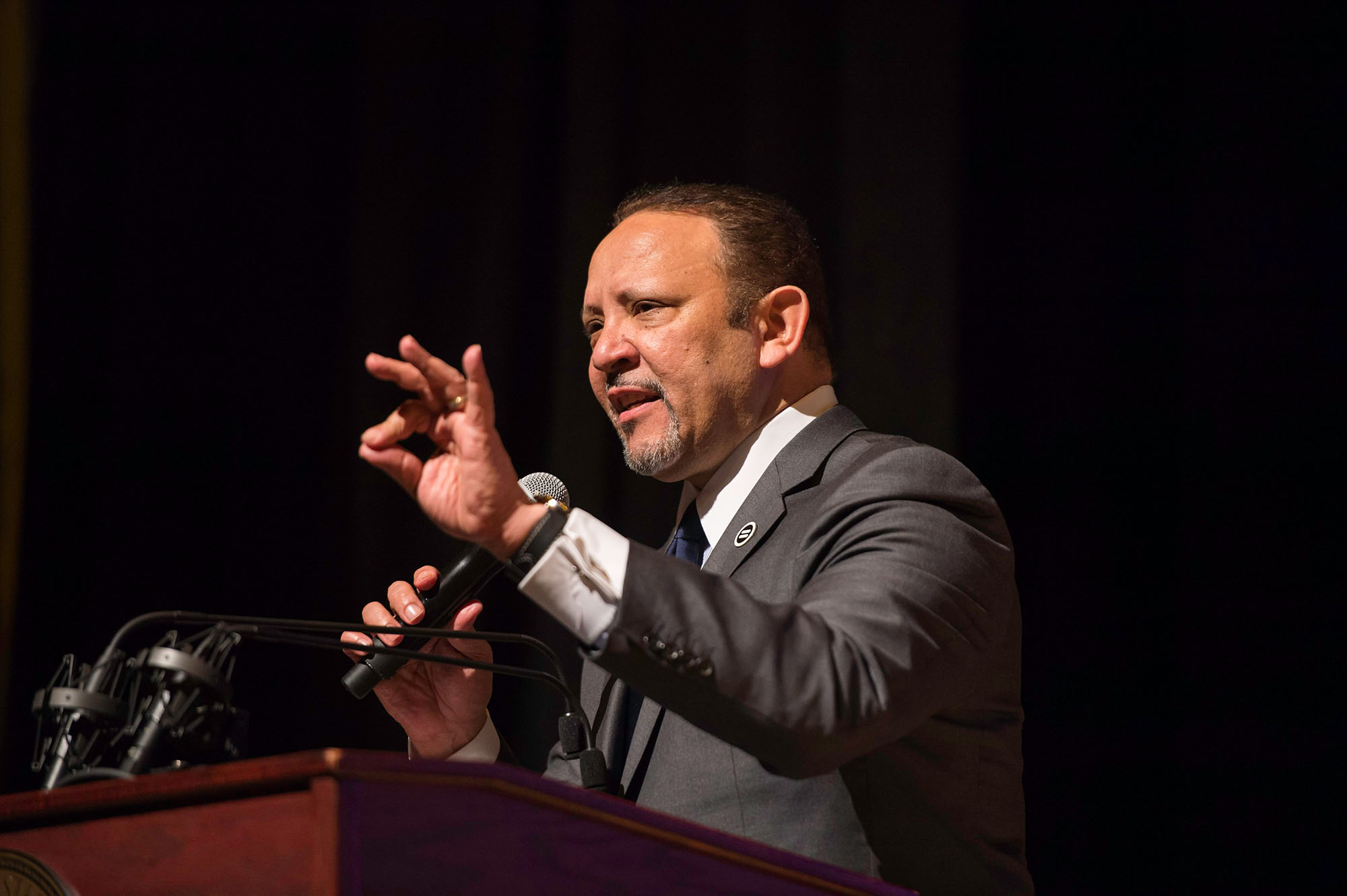 Marc Morial speaks and gestures at a podium during the 2016 Martin Luther King Jr. Commemorative Address at URochester.