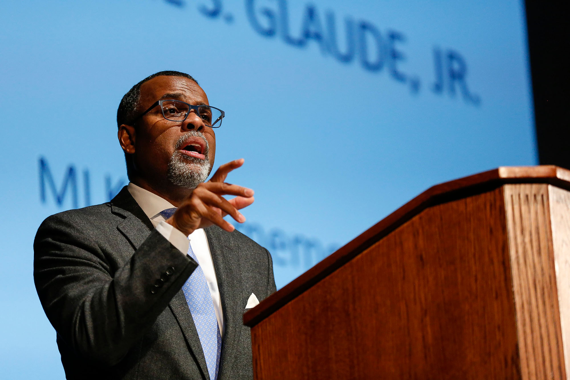 Eddie Glaude Jr. speaking at a podium during the 2020 Martin Luther King Jr. Commemorative Address at URochester. 