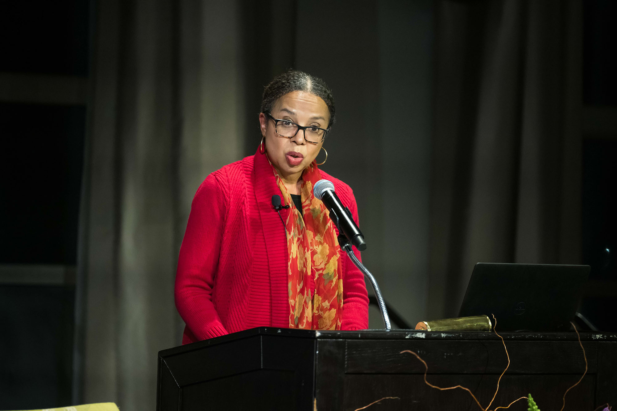 Rachel Swarns speaking at a podium during the 2024 Martin Luther King Jr. Commemorative Address at URochester.