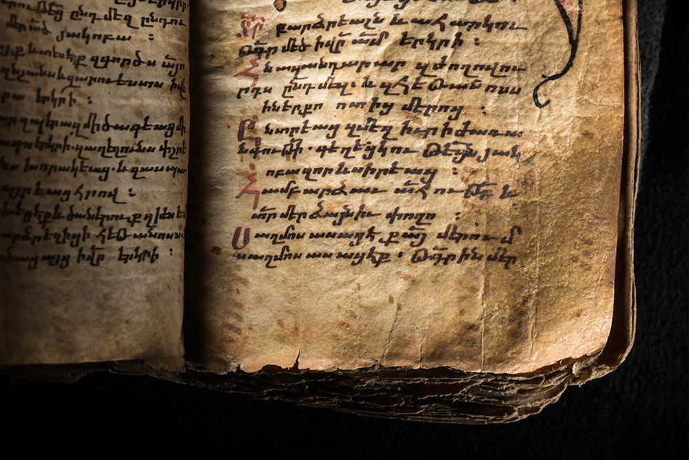 close-up detail of handwritten writing on a page.