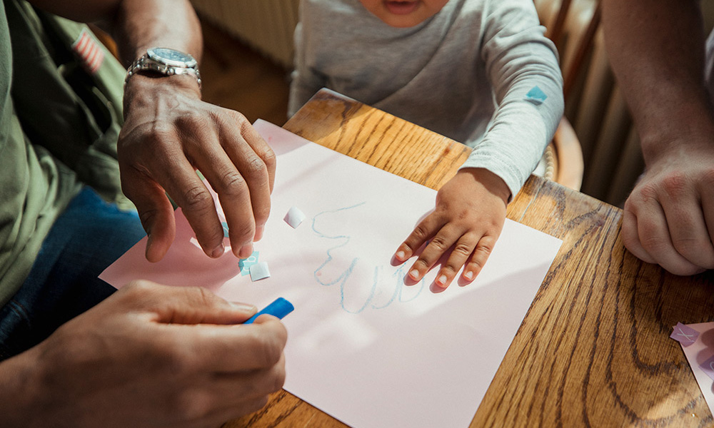 image of family members working on project