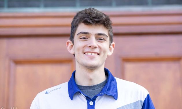 headshot of smiling Fahnestock wearing polo shirt