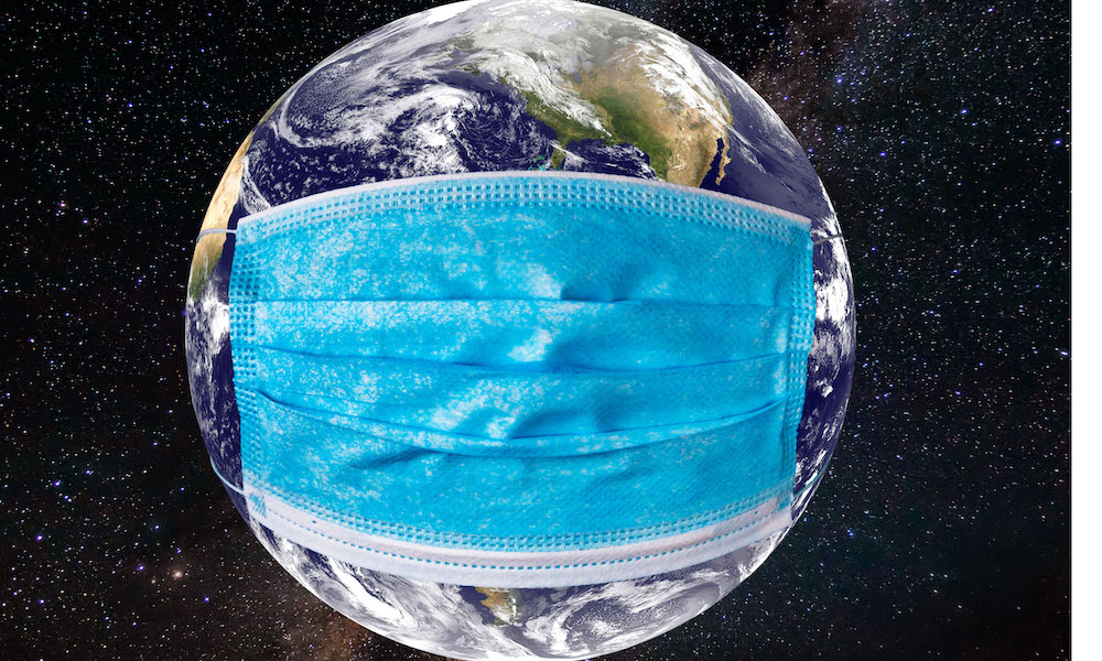 Planet earth with a medical mask.