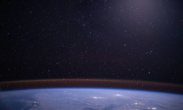 glow over earth's horizon