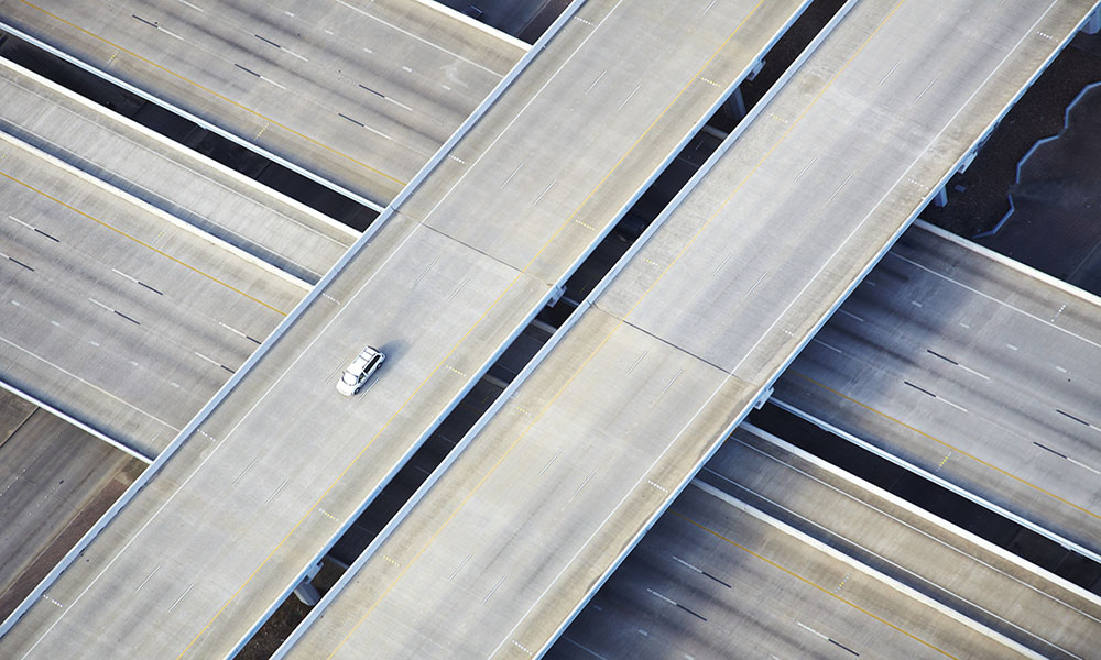 only one car on a busy road
