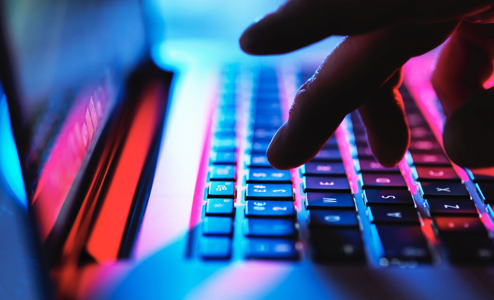 image of keyboard and fingers typing