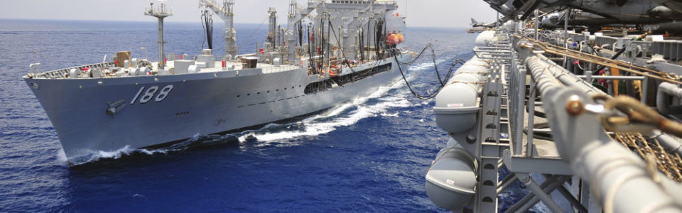 Replenishment oiler USNS Joshua Humphreys refuels USS Boxer.