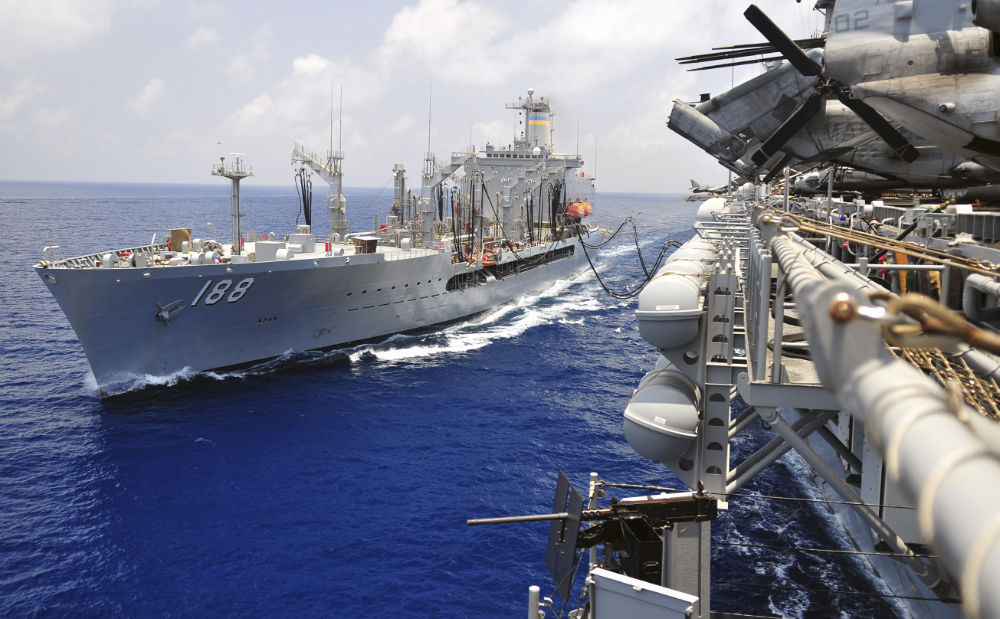 Replenishment oiler USNS Joshua Humphreys refuels USS Boxer.