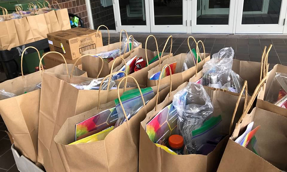 photo of bags filled with materials for students in quarantine