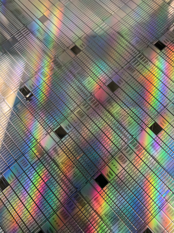 Iridescent surface of an optical chip on a card.