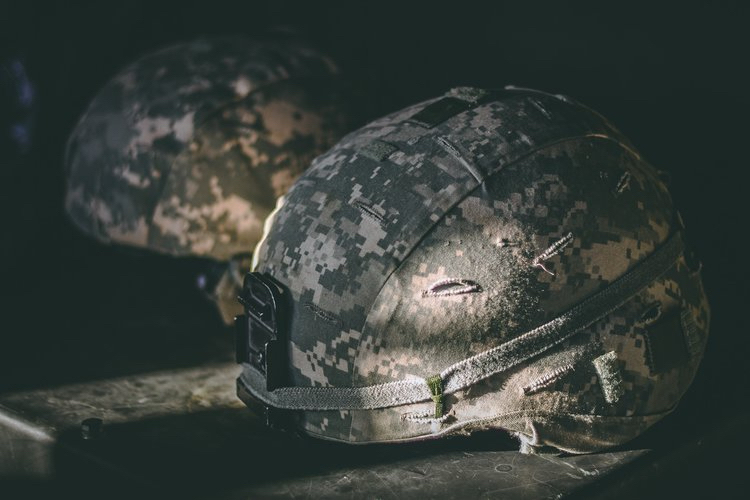 Feature image Two military helmets outfitted with WetWare Biosystems technology.