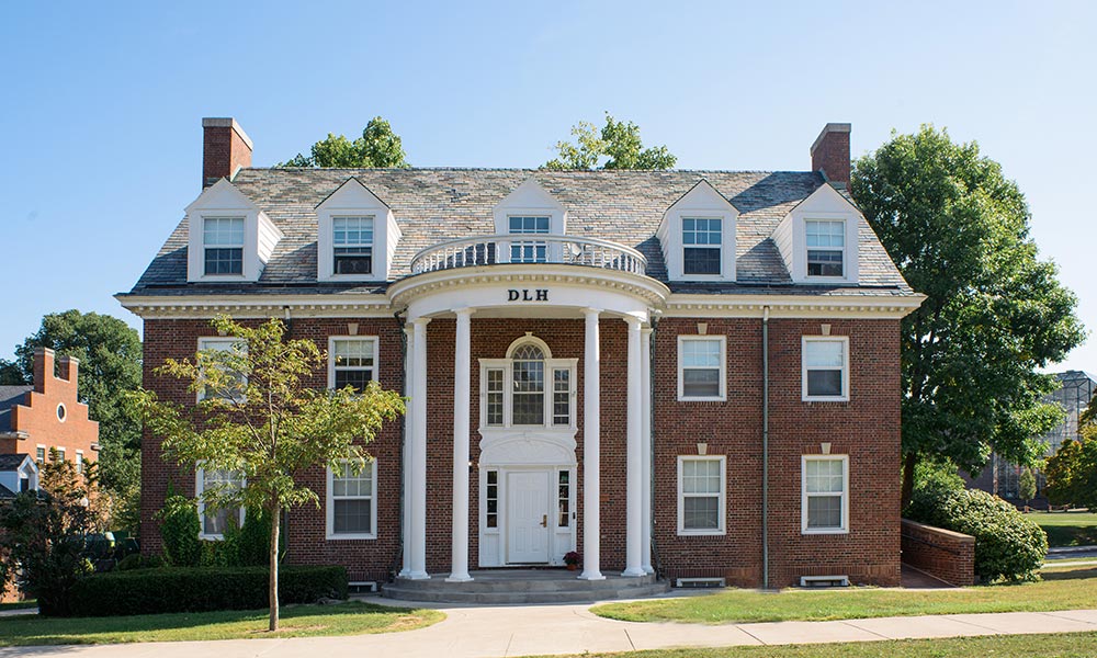 Douglass Leadership House exterior on a sunny day.