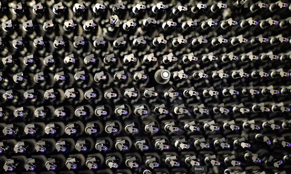 close-up detail of dozens of optical fibers in a grid.