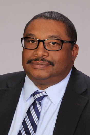 Harl Tolbert formal headshot.