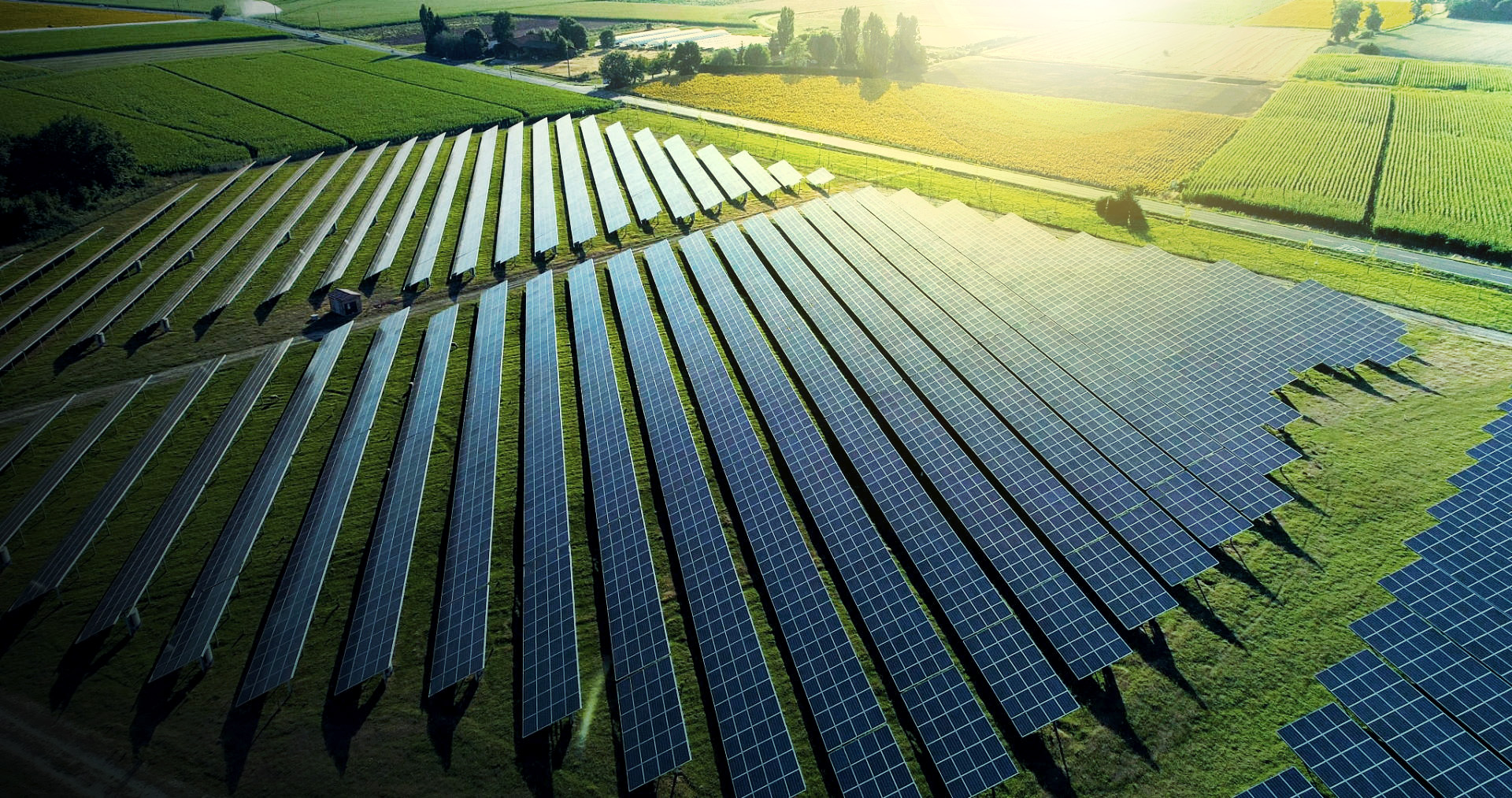 Feature image Aerial view of large community solar farm.