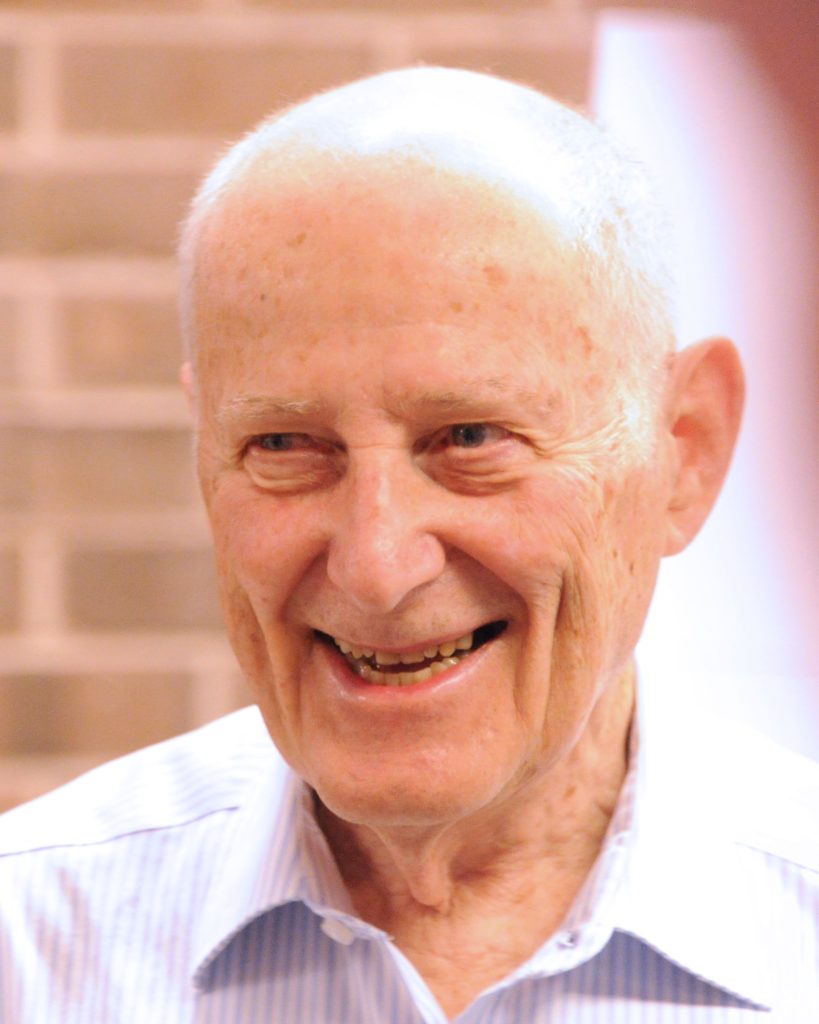 Close-up color picture of Melissinos smiling.
