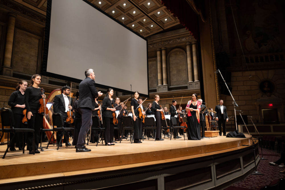 Concert performers on stage at Eastman Theatre in Kodak Hall.