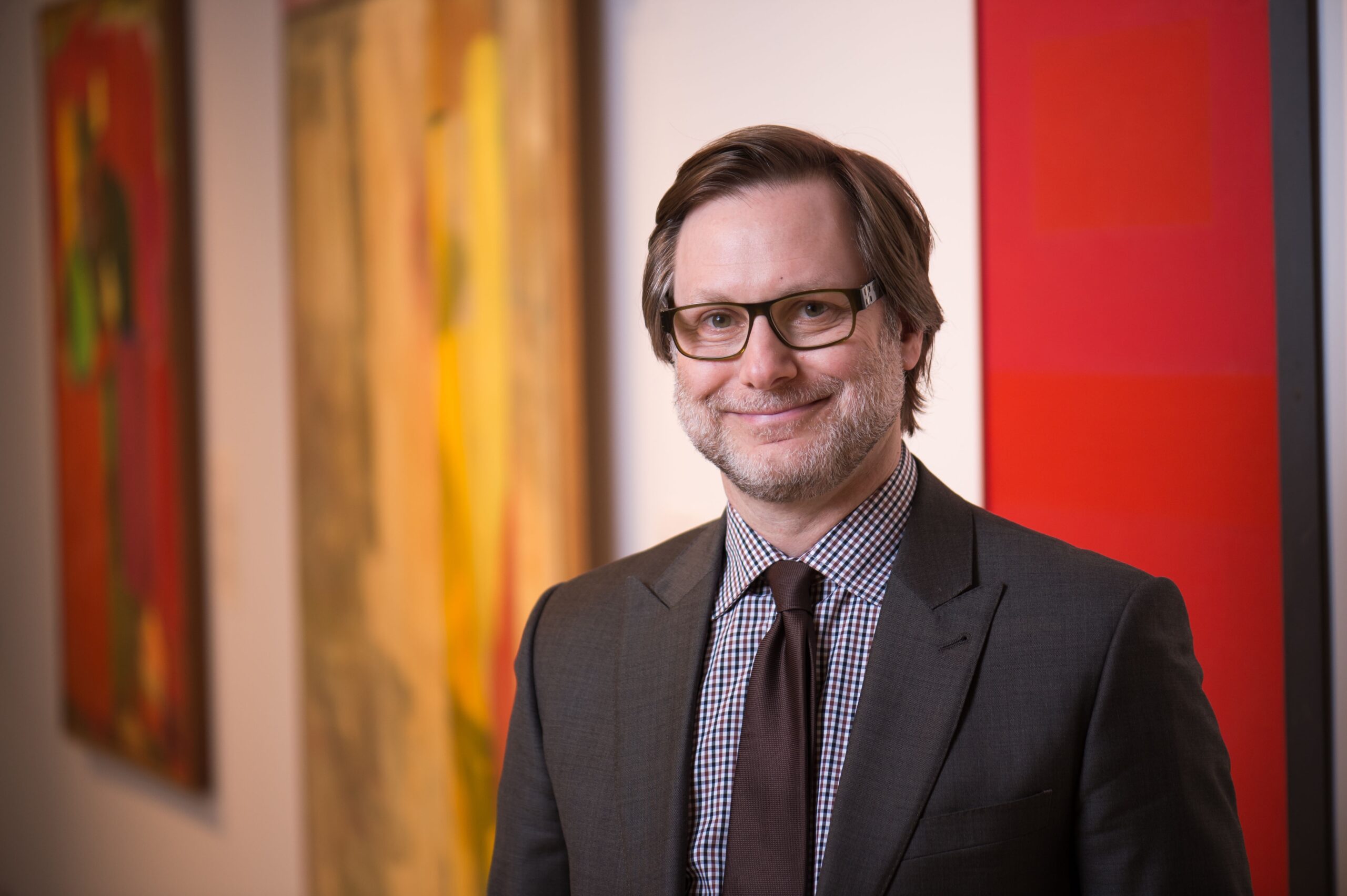 Feature image photograph of Memorial Art Gallery Director Jonathan Binstock in the museum.