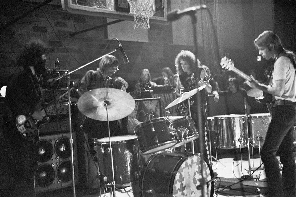 Grateful Dead playing in the Palestra, basketball in the background.