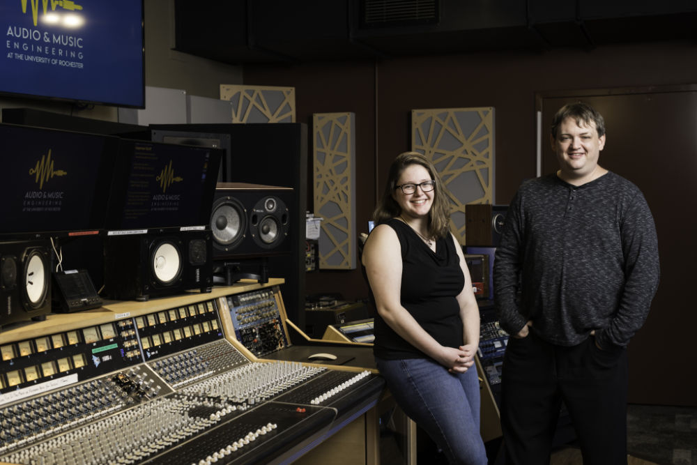 Grace Stensland and Rob McIntyre in a recording studio representing the summer internship she completed with him.