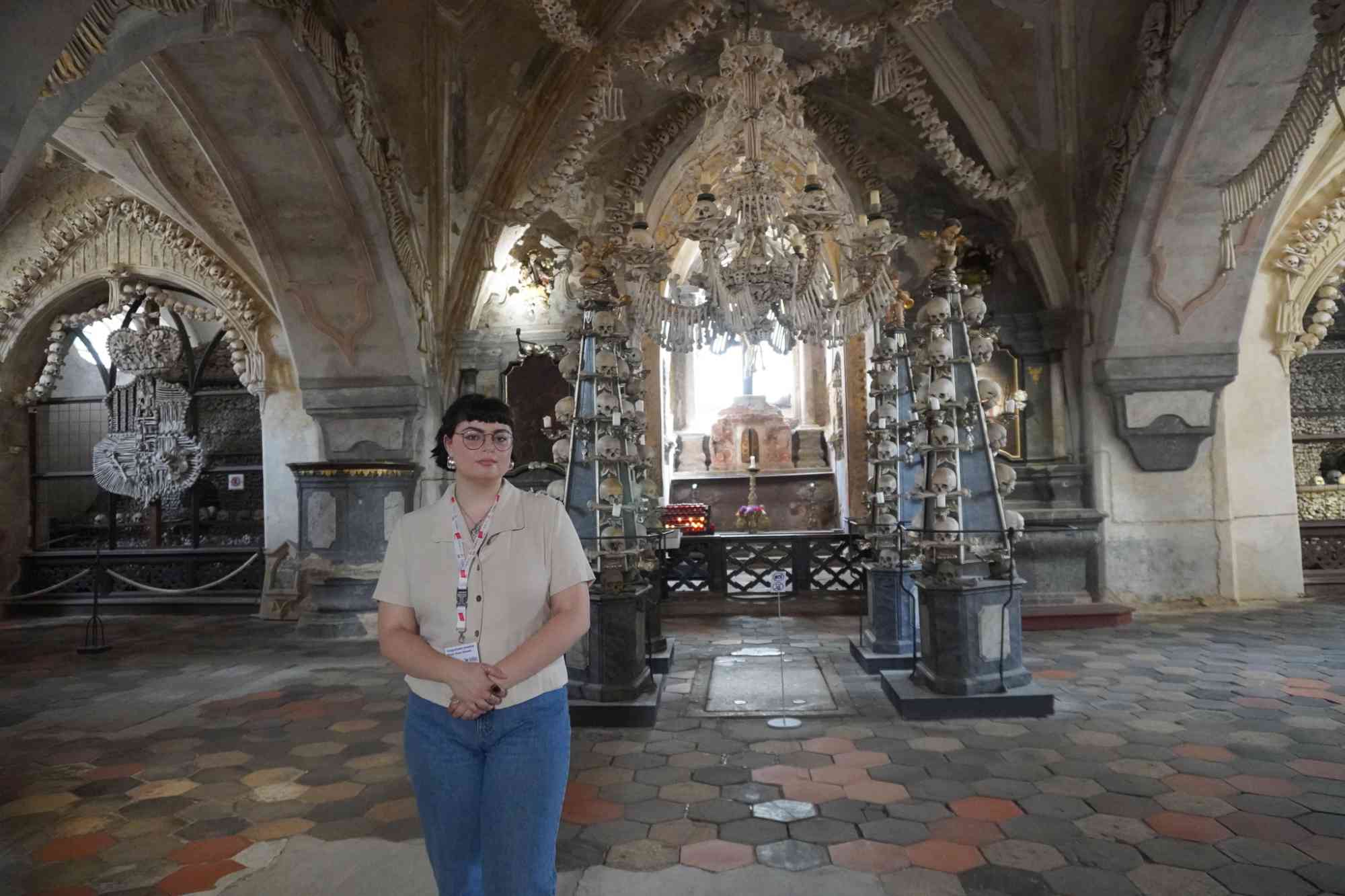 Julia Granato poses for a photo at the Sedlec Ossuary.