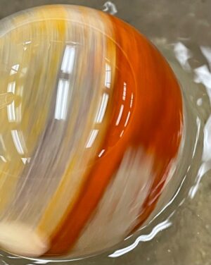 orb with orange and yellow swirls