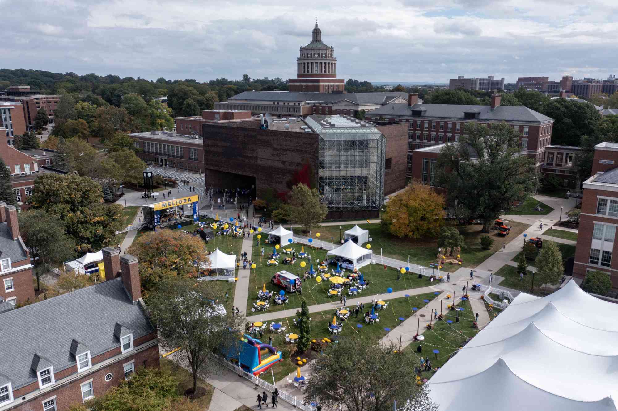 Aerial drone shot of Meliora Village on the Wilson Quadrangle during Meliora Weekend 2023.